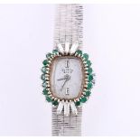 18 carat ladies wristwatch, the strap is a solid solid link with a staircase clasp