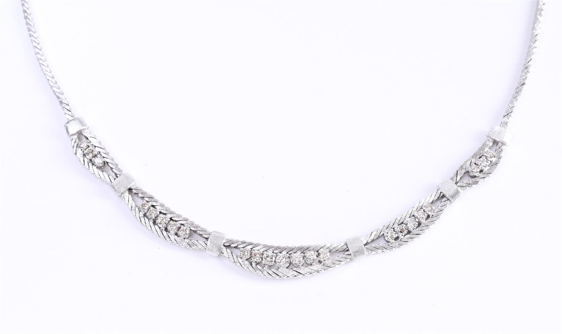 A white gold (14 kt) choker necklace set with 23 brilliant cut diamonds