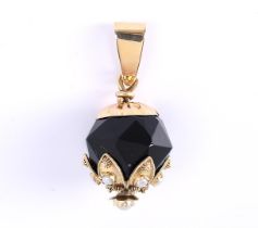 14kt yellow gold Surinamese Ogri ai pendant with facet cut onyx