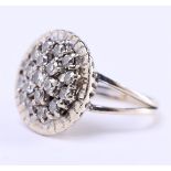 14 carat white gold cluster ring set with approximately 19 brilliant cut diamonds