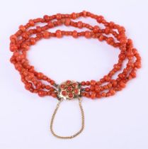 14 kt red coral women's bracelet, with 3 strands of partly knotted red coral on trenches