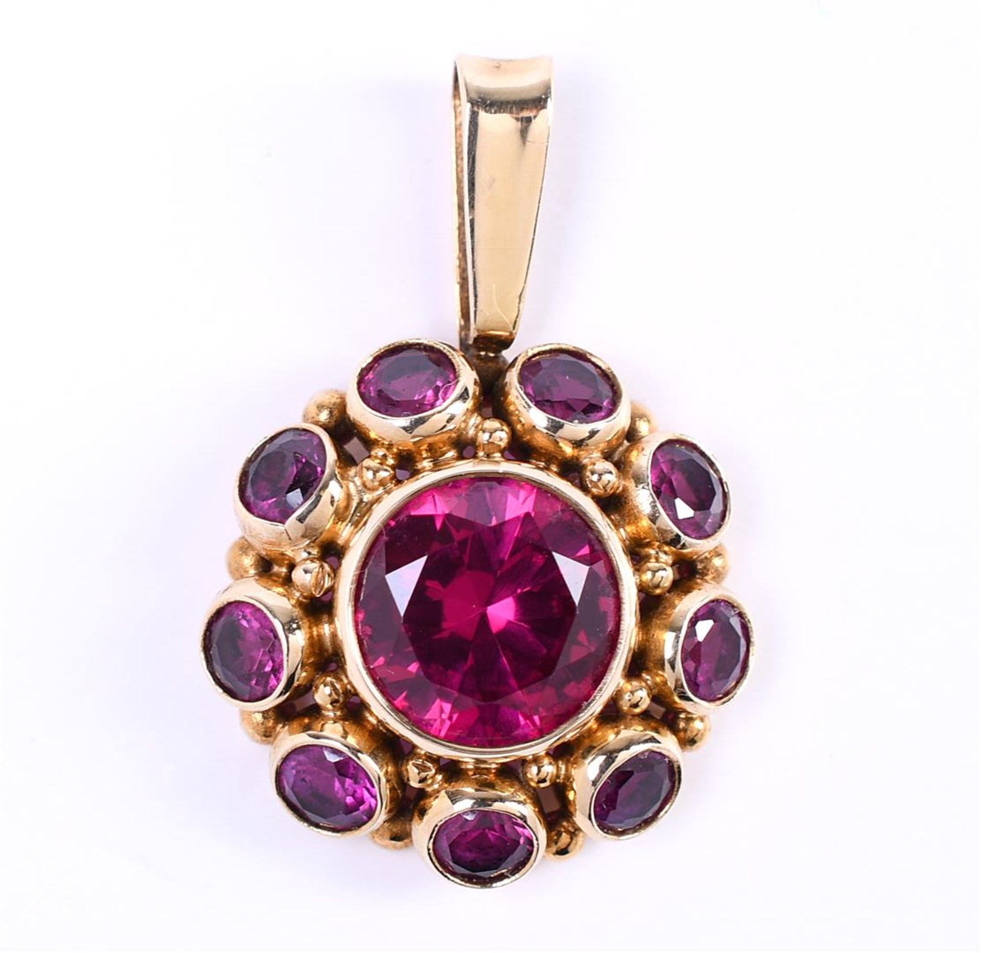 14 carat yellow gold ladies rosette pendant, set with 1 x synthetic ruby of approx. 7.5 mm