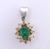 14 kt bicolor gold entourage pendant set with diamond and emerald