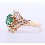 14kt yellow gold cocktail ring set with 1 oval cut Colombian emerald of 0.85ct.