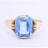 14 kt yellow gold solitaire ring set with emerald cut imitation aquamarine