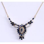 14kt yellow gold cluster necklace set with diamond and sapphire