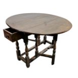 A so-called gateleg table. England, 19th century.