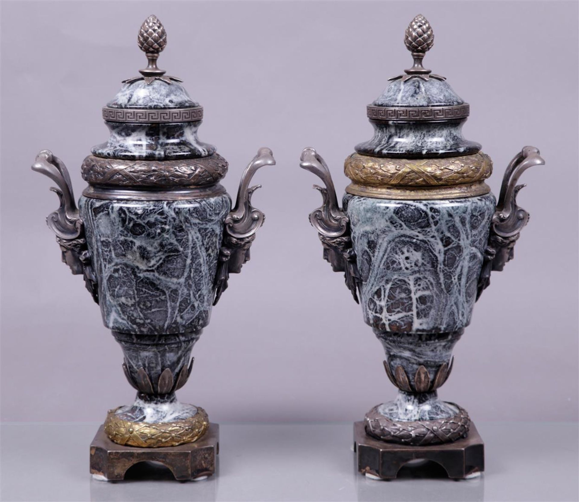 A pair of marble casolettes with cast bronze frames. Italy.
H. 44,5 cm. - Image 3 of 3