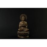 A bronze Buddha. Tibet, 20th century.
H. 25 cm.