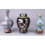 A lot of diverse cloisonne consisting of two vases and a ginger jar.