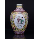A porcelain famile rose vase decorated with figures in borders, marked Qianglong. China, republic.
H