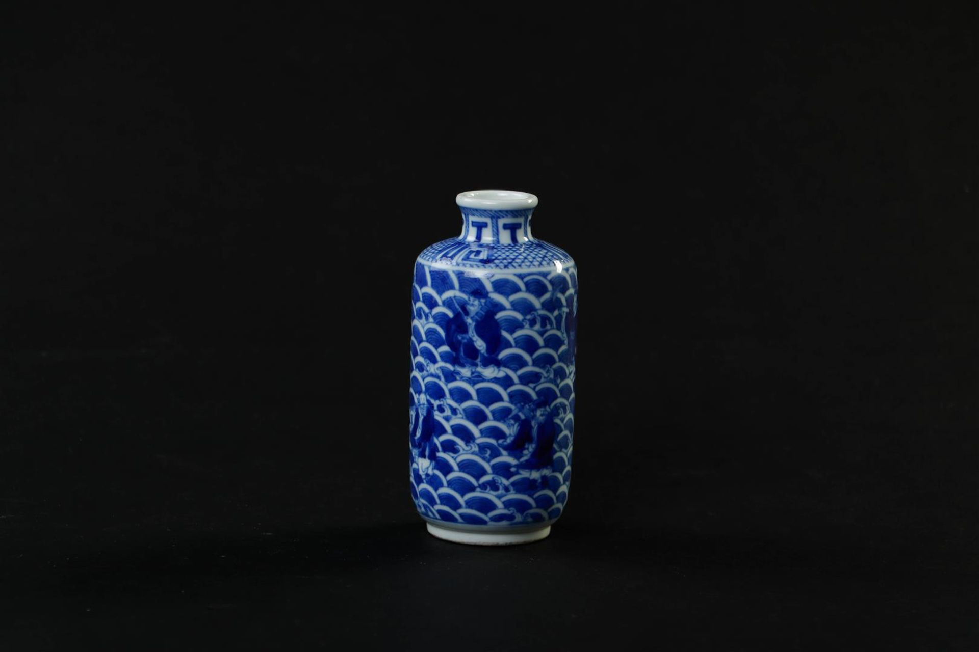 A porcelain cylindrical vase with a decor of figures in waves, marked Guanxu. China, 19th century.
H - Image 3 of 5