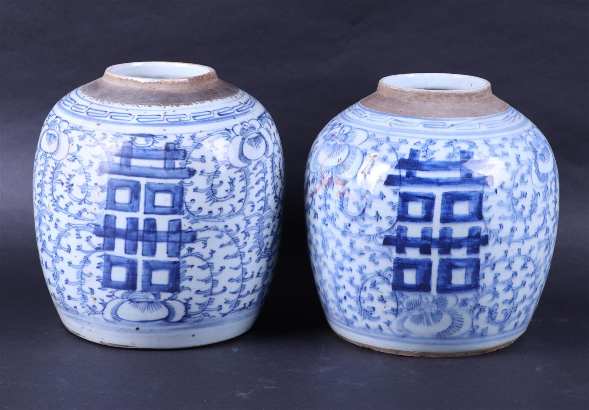 Two porcelain storage jars with double happiness decor, seal mark on the bottom. China, 19/20th cent