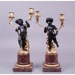 A set of second Empire style candlesticks on pink marble bases.
H.: 53 cm.