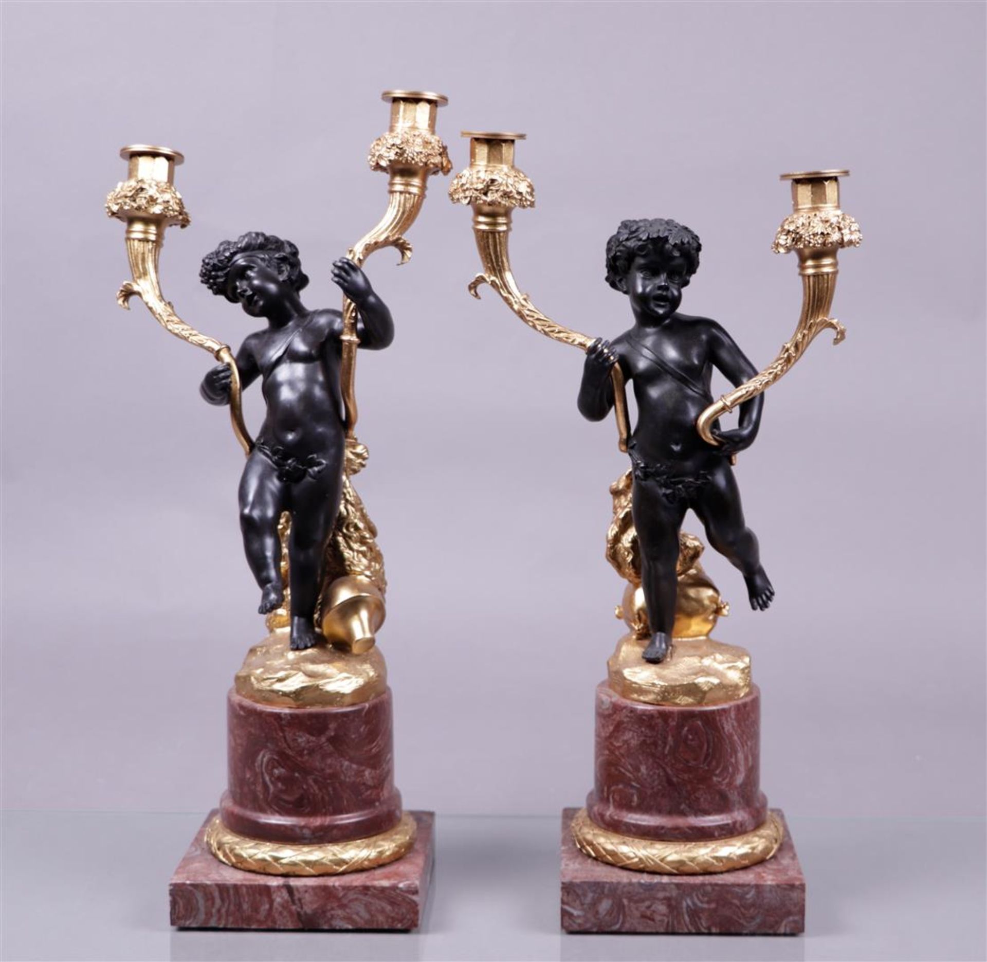 A set of second Empire style candlesticks on pink marble bases.
H.: 53 cm.
