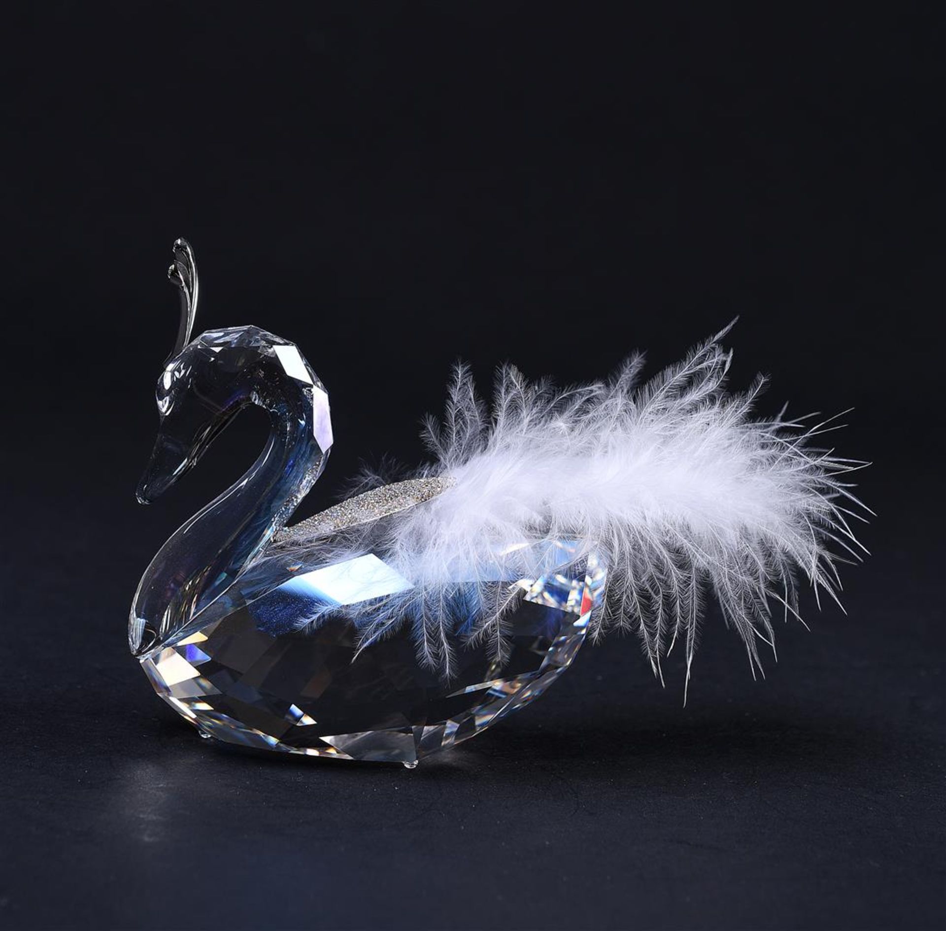 Swarovski,winter swan Year of publication 2010, 1054571. Includes original box and glass shoe.
H. 8,