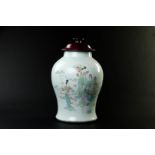 A porcelain baluster vase with hardwood lid, figural frames, poem on the back. China, Tongzhi.
H. 40