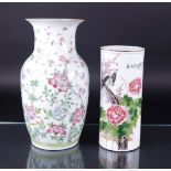 A lot consisting of a baluster vase with floral decor and a brush pot with a decor of birds, flowers