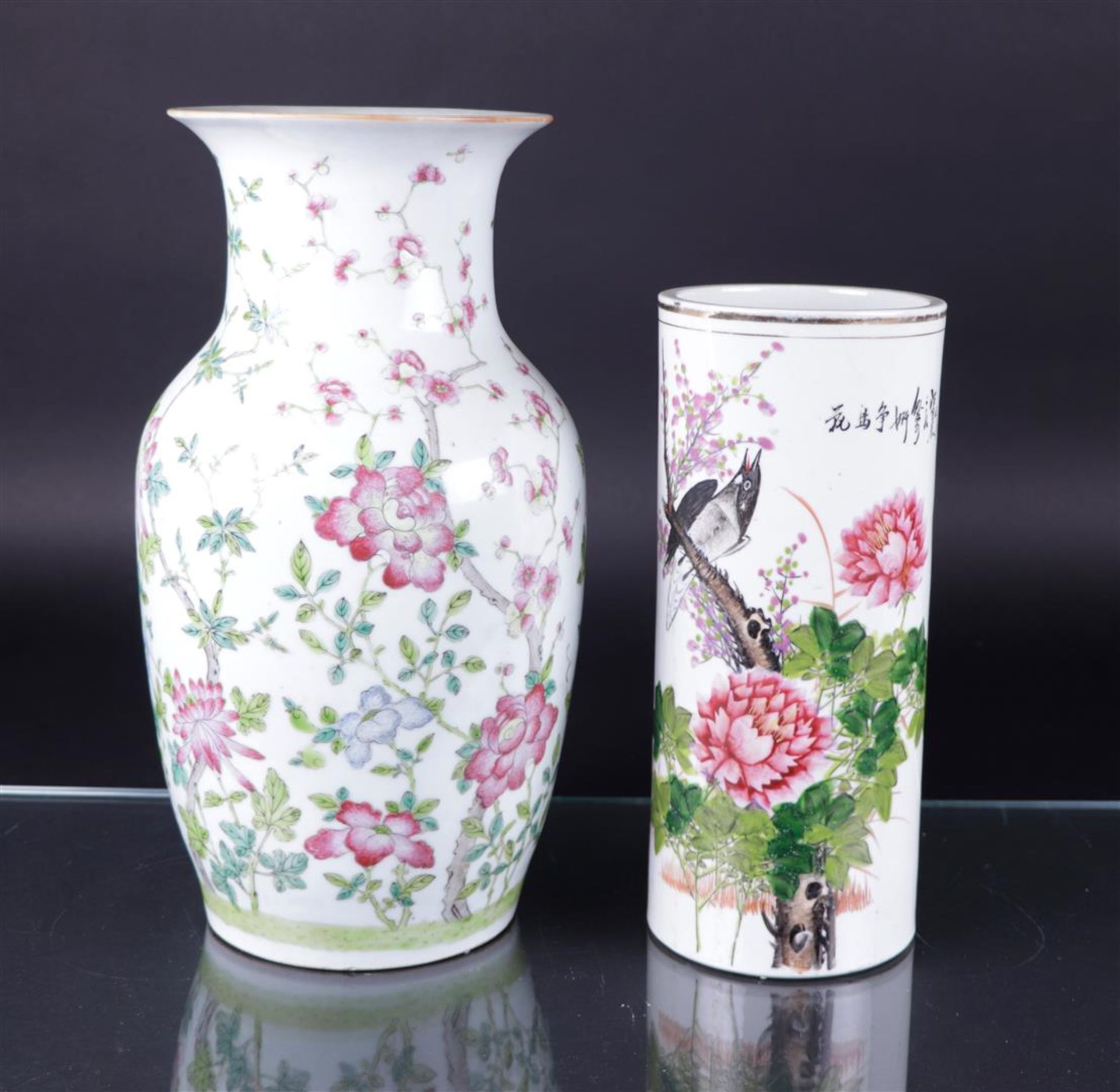 A lot consisting of a baluster vase with floral decor and a brush pot with a decor of birds, flowers