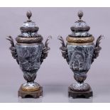 A pair of marble casolettes with cast bronze frames. Italy.
H. 44,5 cm.