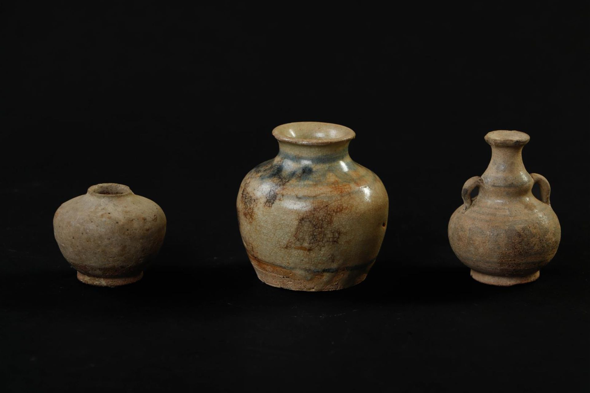 Lot of two ointment jars and a gourd model with ears, Ming period.
H. 9 cm. - Image 2 of 4