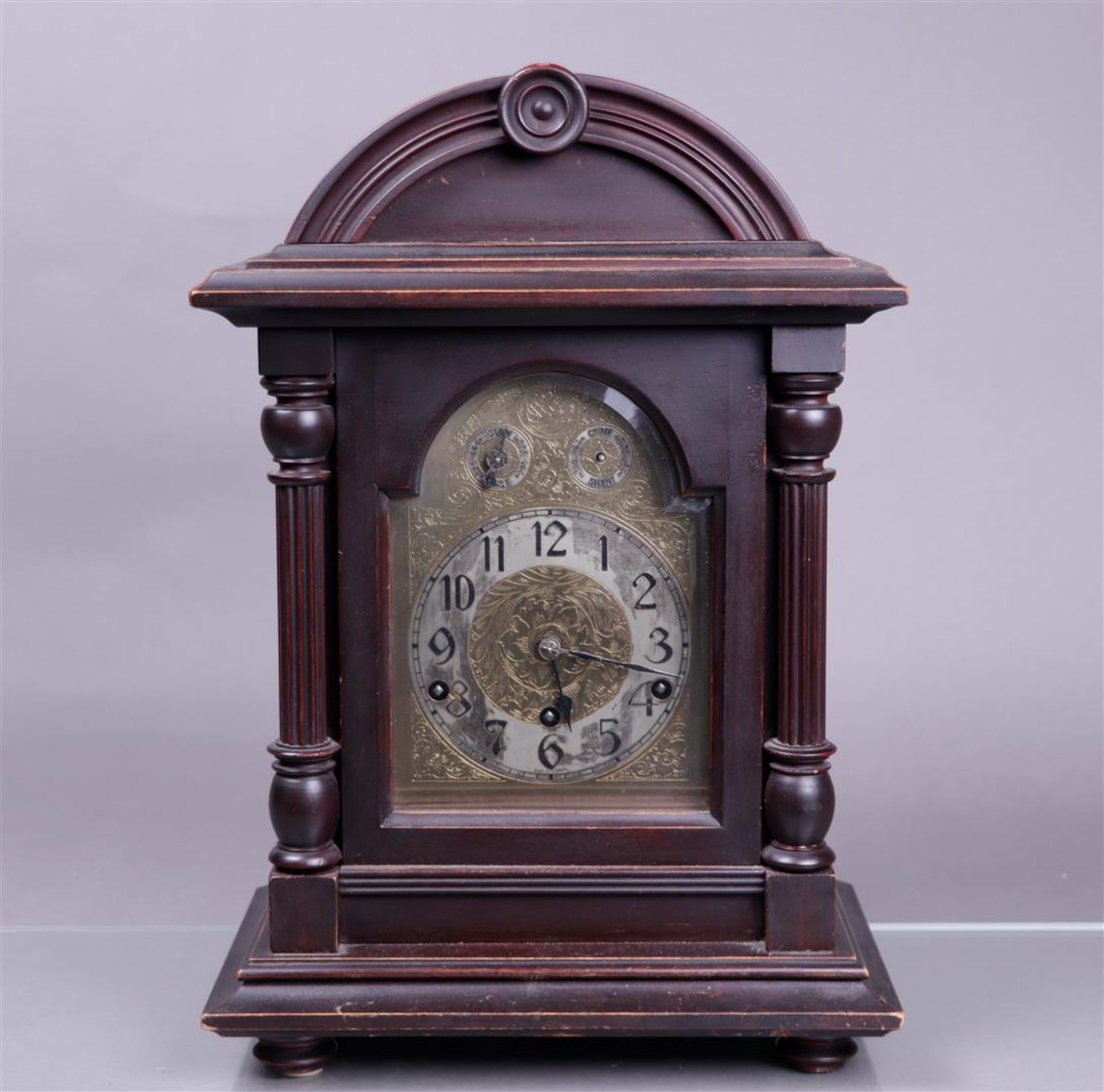 A Kienzle table clock in a softwood case. Equipped with music and pendulum. First quarter of the 20t