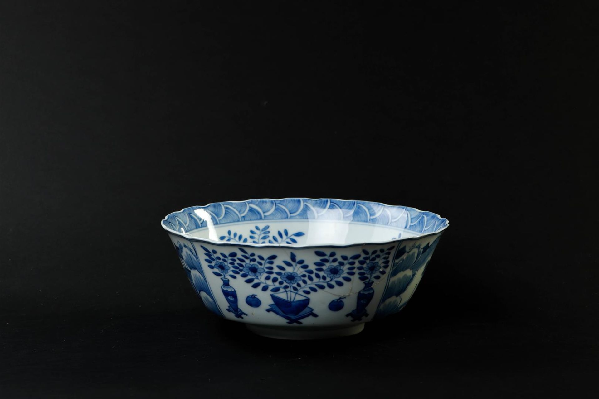 A large porcelain bowl decorated with landscapes and antiques, marked Kangxi. (glued). - Image 3 of 6