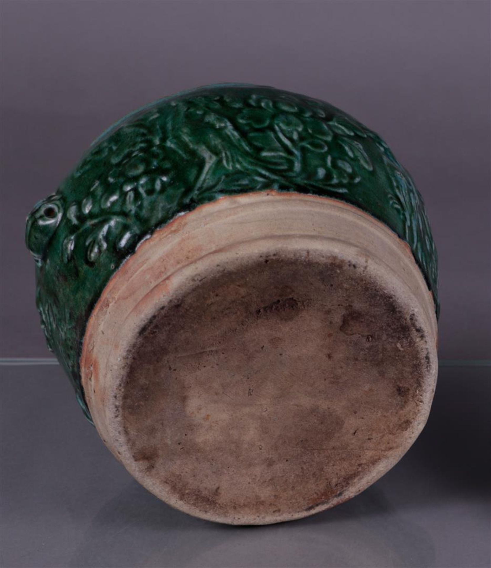 A green glazed lidded container. China, Ming?
Diam. 24 cm. - Image 4 of 4