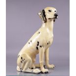 A cast vintage statue of a seated Dalmatian. First half 20th century.
H.: 73 cm.