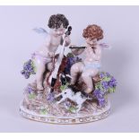 A porcelain group depicting two putti playing music, marked Sitzendorf. Germany, 20th century.
23 x 