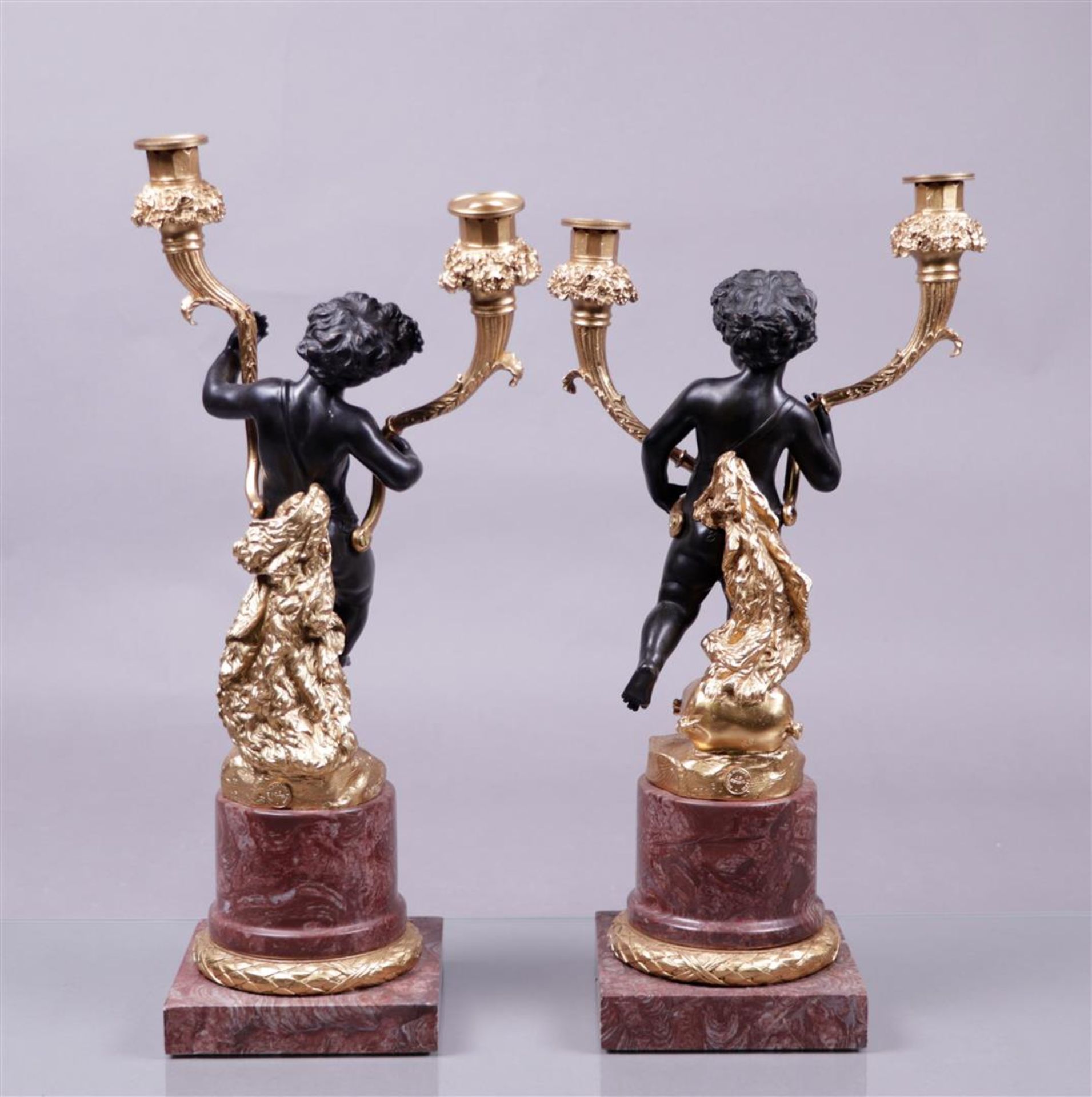 A set of second Empire style candlesticks on pink marble bases.
H.: 53 cm. - Image 3 of 3