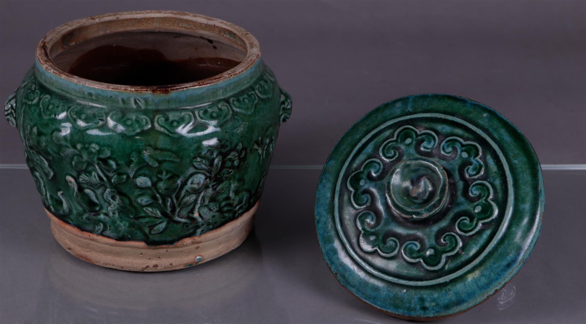 A green glazed lidded container. China, Ming?
Diam. 24 cm. - Image 3 of 4