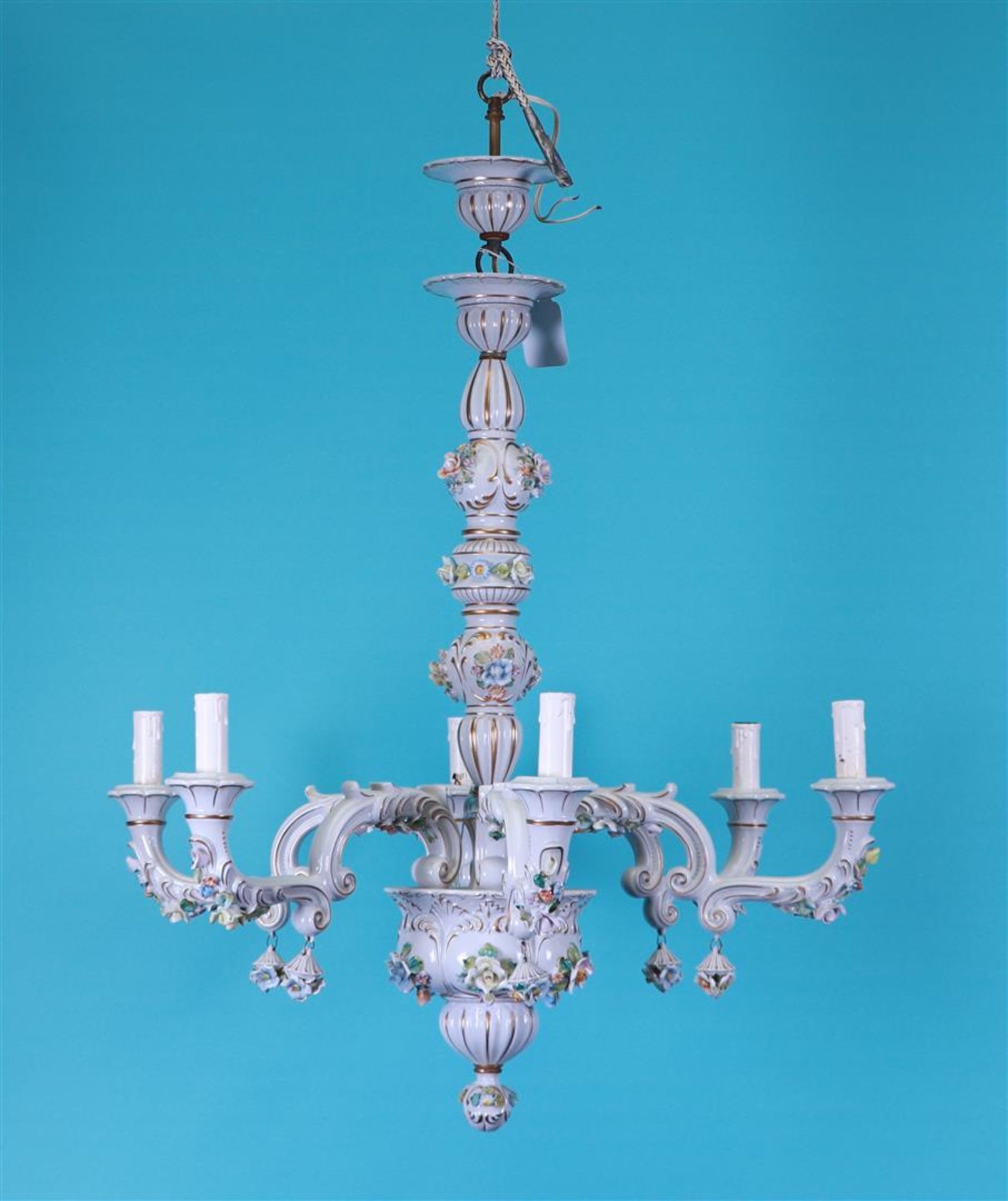 A five-armed porcelain chandelier decorated with flowers, marked Capodimonte. Naples, 20th century.
