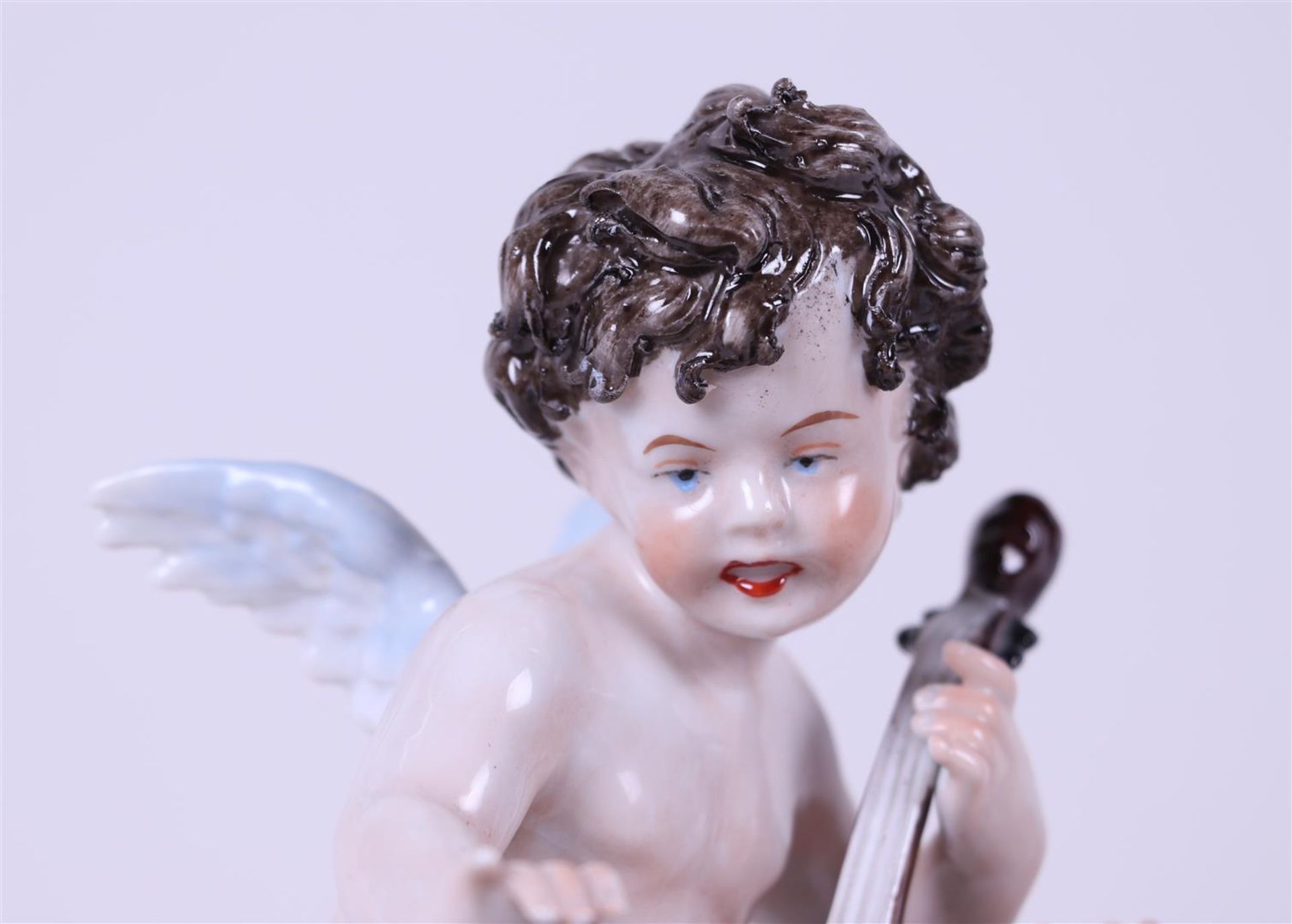 A porcelain group depicting two putti playing music, marked Sitzendorf. Germany, 20th century.
23 x  - Bild 2 aus 7