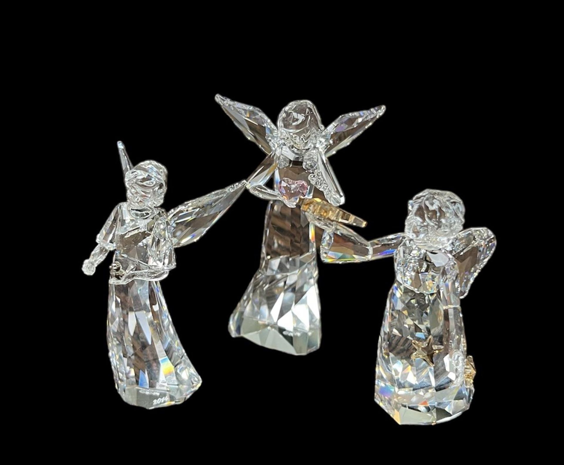 Swarovski, lot of three Christmas ornaments, 1054562, 5004493 & 5047231. In original box.