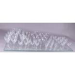 A large crystal tableware consisting of twelve red wine glasses, 10 white wine glasses, twelve desse