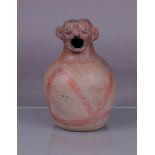 An anthropomorphic pre-Columbian jar.
H.: 23,5 cm.