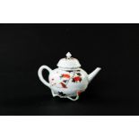 A porcelain teapot with cherry blossoms, bird on branch, lid in lotus shape, gravito decoration lid.