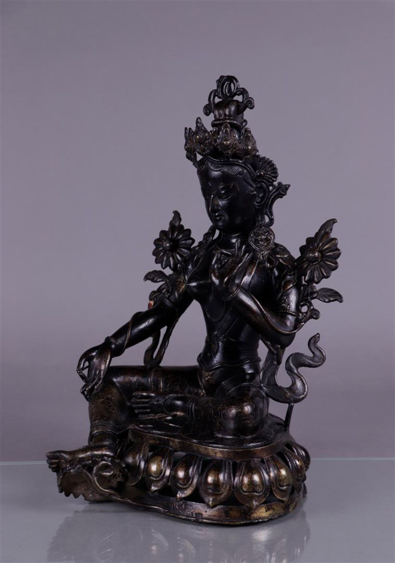 A bronze Tara. Tibet, 20th century.
41 x 26 cm. - Image 5 of 5