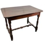 An oak kitchen table on twisted legs with ditto rules. England, first half of the 19th century.