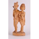 A Balinese carving of a bride and groom, Indonesia, first half 20th century.
H.: 60,5 cm.