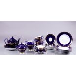 A porcelain tea set, marked Lomosov. Russia, 20th century.