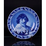 A Delft blue so-called 'Rembrandt dish' with a depiction after Frans Hals Portrait of a man, after t
