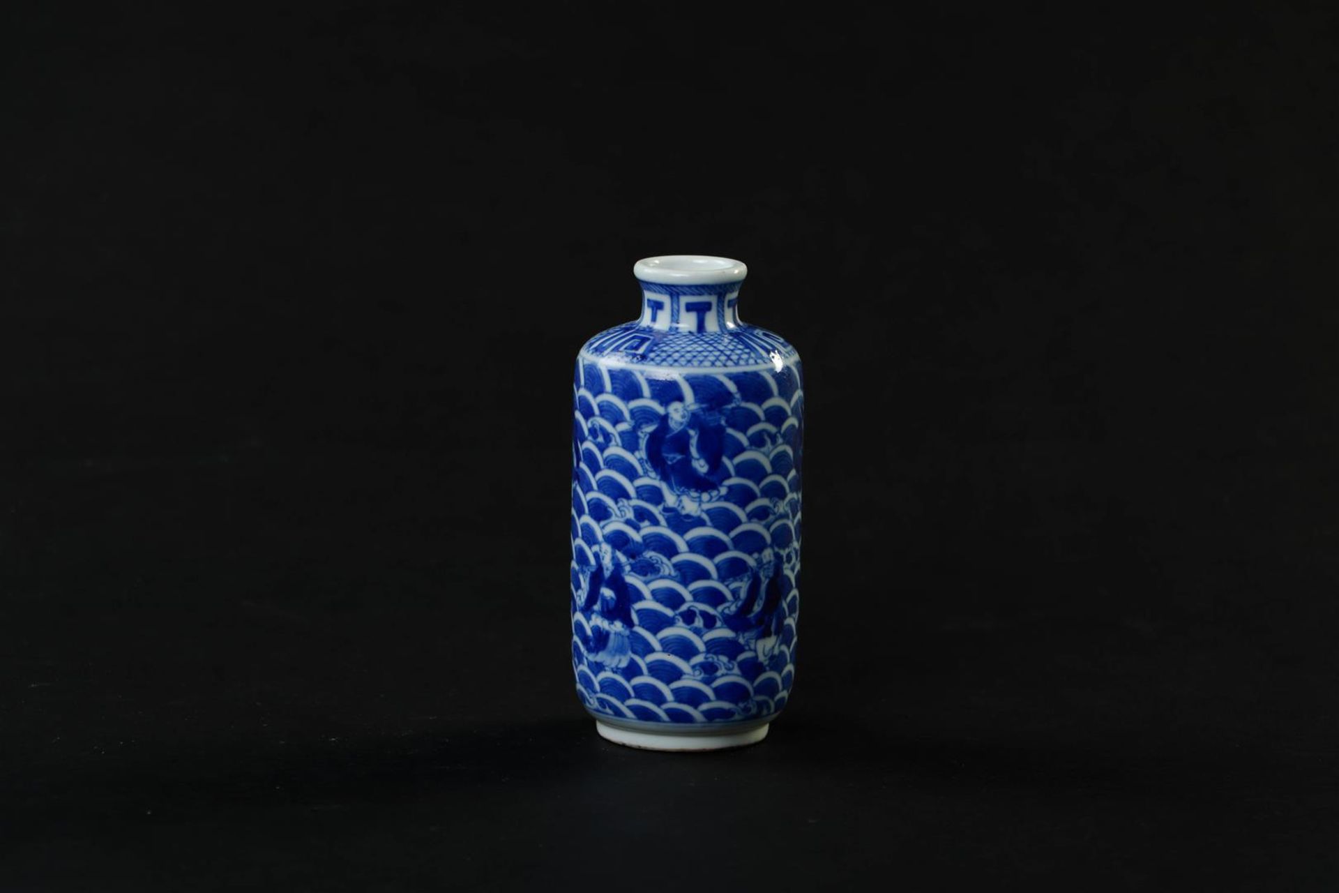 A porcelain cylindrical vase with a decor of figures in waves, marked Guanxu. China, 19th century.
H - Image 2 of 5