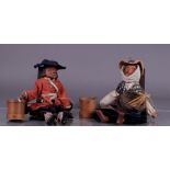 A pair of Breton marionettes in original costume, late 19th century.