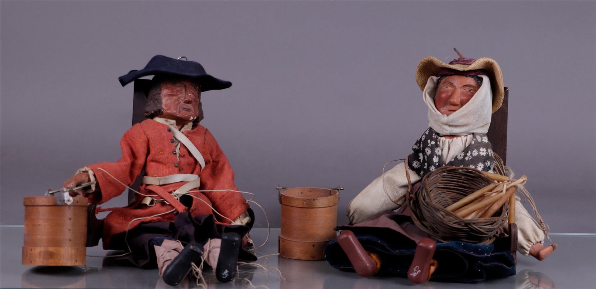 A pair of Breton marionettes in original costume, late 19th century.