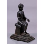 A bronze Buddha Assis. Tibet 20th century.
H. 34 cm.