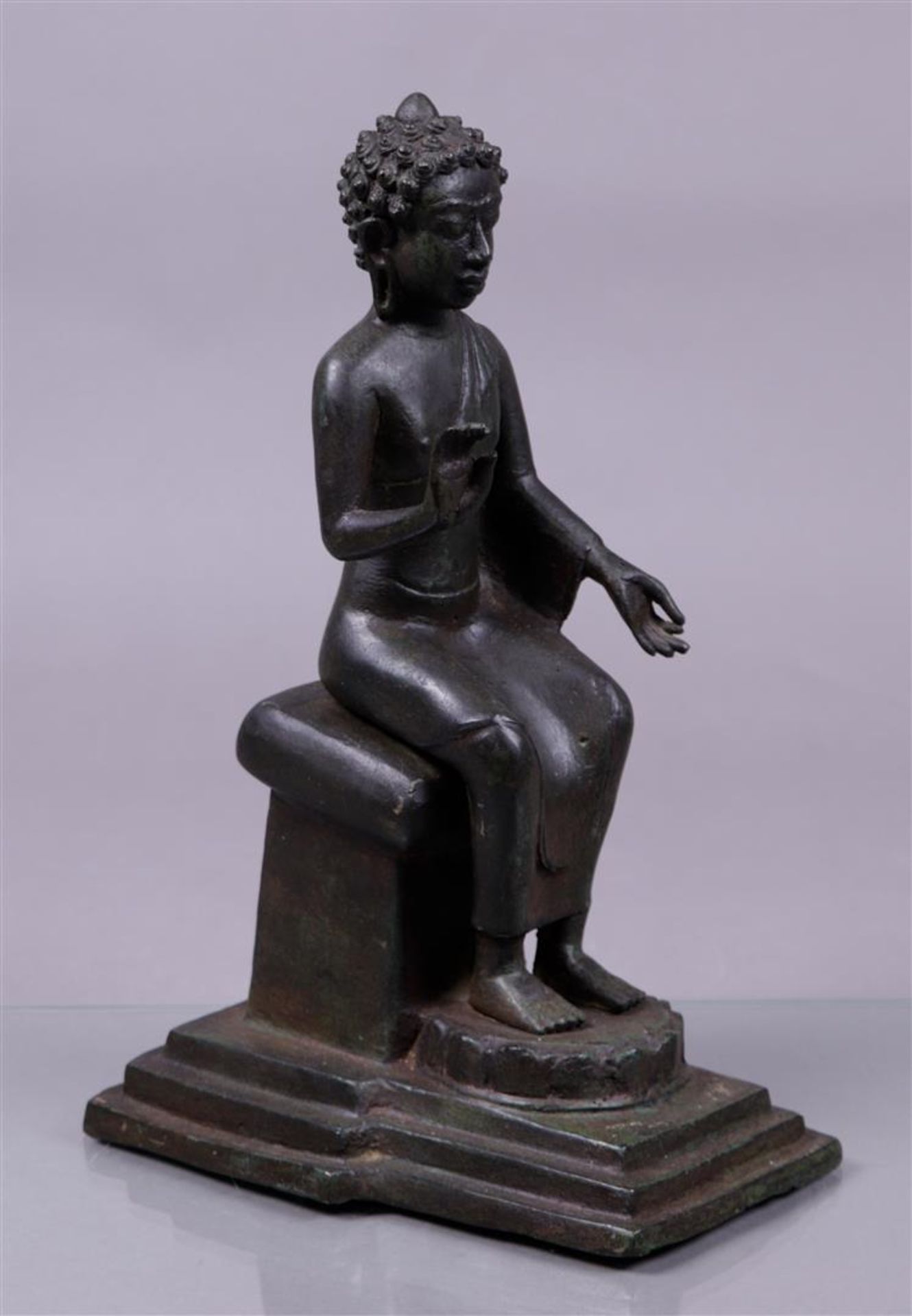 A bronze Buddha Assis. Tibet 20th century.
H. 34 cm.
