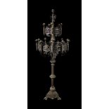 A large wrought iron church candlestick.