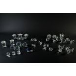 Swarovski, lot with various figures and candlesticks.